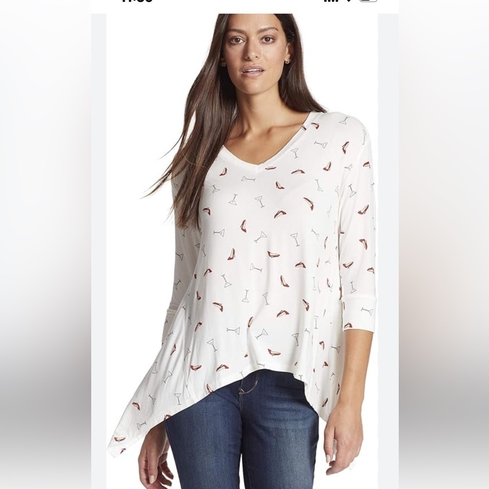 Skinny woman shark bite long sleeve top size medium white cocktail party